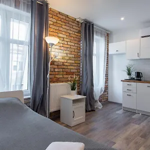 https://stay99-apart.poznan-hotels.com
